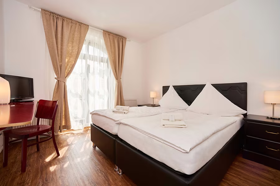 Spacious Family room at Hotel Matzbach with two beds and daylight
