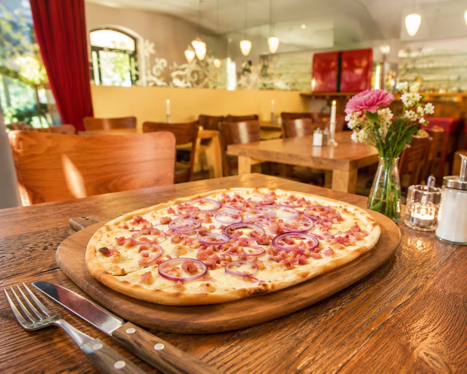Crisp tarte flambée at Matzbach restaurant on the Bergmannkiez